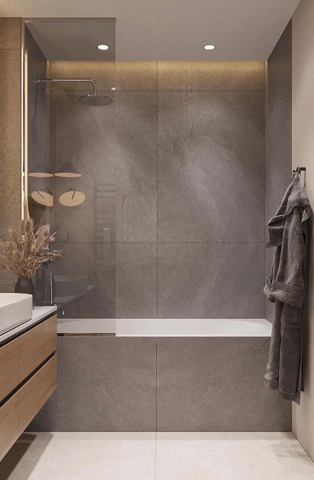 Bathroom renovation with tiled tub and shower surround